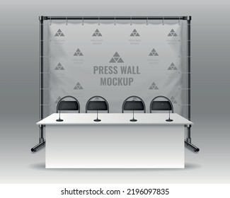 Press wall mockup behind table with microphones for media conference realistic vector illustration