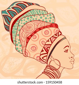 Pretty African American Girl in traditional turban. Profile view. 