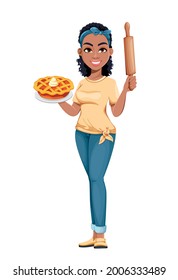 Pretty African American housewife holding sweet pie