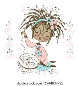 A pretty black girl is engaged in needlework and embroiders a beautiful pattern on the hoop. Vector.