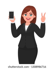 Pretty businesswoman showing blank screen mobile, cell or smart phone and gesturing or making victory, V or peace sign with hand fingers. Mobile phone technology illustration in cartoon style.