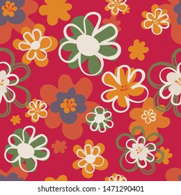 Pretty floral seventies seamless pattern in red, orange and green. Layered  flower blooms in a lively all over print. Great for textiles, home decor, stationery, paper goods and fashion use. Vector.