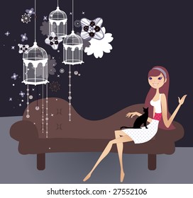 pretty girl sitting at the sofa with a cat