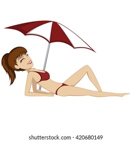 A pretty girl is sunbathing (under a sunshade)