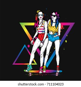 Pretty girls in tops and shorts stand on a skateboard. Vector illustration for a postcard or a poster. Bright, colorful drawing.