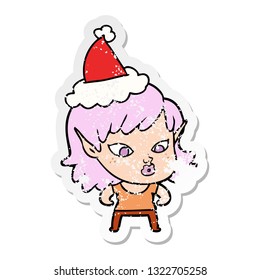 pretty hand drawn distressed sticker cartoon of a elf girl wearing santa hat
