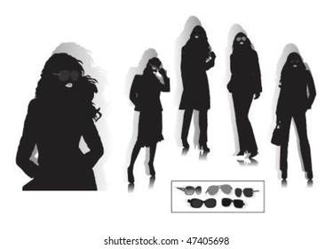 Pretty ladies with sun-glasses.