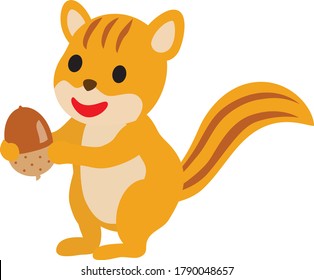 A pretty orange squirrel with an acorn