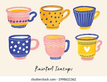 Pretty painted tea cups vector