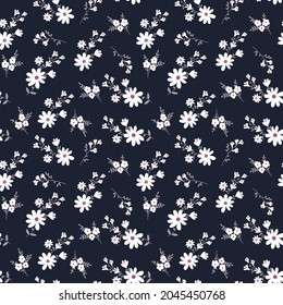 Pretty pattern in small flowers on dark background. Vector seamless floral pattern. Ditsy print.
