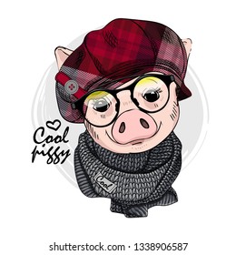 Pretty pig with glasses, red checkered cap and knitted scarf. Hand drawn illustration of dressed piggy. Vector illustration.