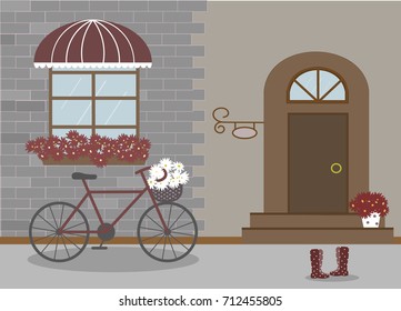 Pretty scenery in a rustic style. House, window with a striped awning, door, stairs, red flowers. Bike and basket of daisies. Rain boots with polka dots. Decorative brick wall. Vector illustration