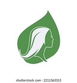 Pretty woman face with long hair silhouette illustration. Female hair beauty salon logo or symbol.