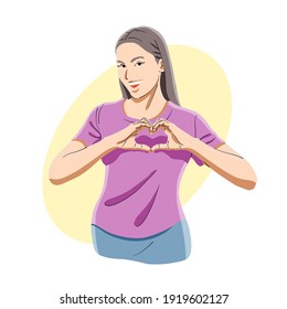 Pretty woman showing heart and love gesture 