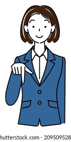 A pretty woman in a suit, smiling and pointing downward with her finger. Business person illustration vector
