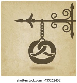 pretzel bakery symbol old background. vector illustration - eps 10