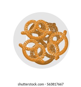 Pretzel on plate top view. beer snack on dish. Food for Oktoberfest celebration in Germany
