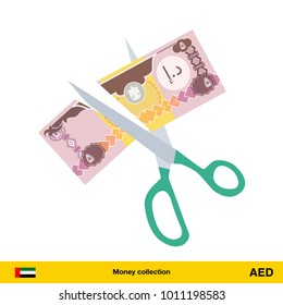 Price or cost reduction concept. Scissors cutting money bill. Dirham banknote.