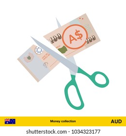 Price or cost reduction concept. Scissors cutting money bill. Australian dollar banknote.