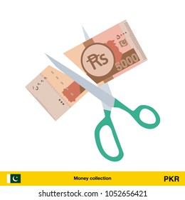 Price or cost reduction concept. Scissors cutting money bill. Pakistan rupee banknote.