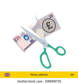 Price or cost reduction concept. Scissors cutting money bill. British pound banknote.