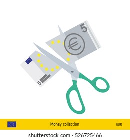 Price or cost reduction concept. Scissors cutting money bill. Euro banknote.