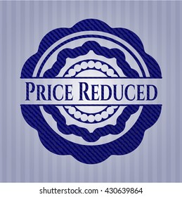Price Reduced badge with denim background