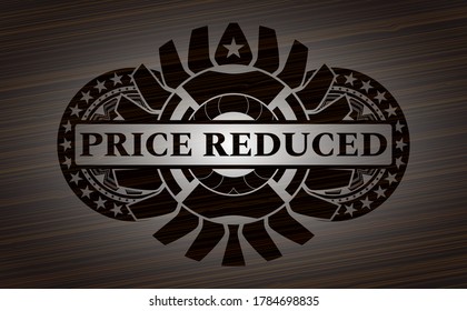 Price Reduced text inside dark wood emblem. Brown fancy background. Artistic illustration. 