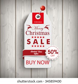 Price sticker with emblem for the christmas sale on the wooden background. Eps 10 vector file.