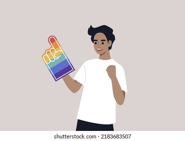 A Pride foam finger colored with rainbow colors, LGBTQ community support