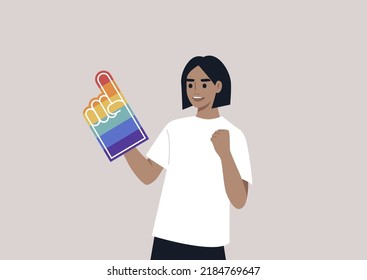 A Pride foam finger colored with rainbow colors, LGBTQ community support