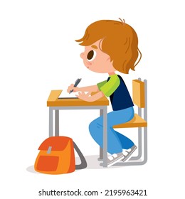 A primary school student sits at a desk and writes the lesson in notepad or copybook. Elementary school student study in the classroom sitting at the desk. Kid getting knowledge, doing homework home