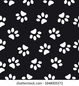 Print Hand-drawing silhouette animal paw. Vector Seamless pattern.