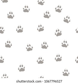 Print the paws of the wolf. Seamless pattern background. Gray design vector illustration.