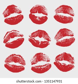Print of red lips set. World kiss day, Valentine's day design elements. Vector illustration of womans girl red lipstick kiss mark isolated on white background.