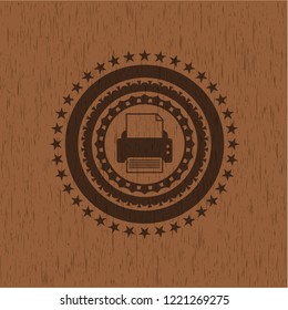 printer icon inside badge with wood background