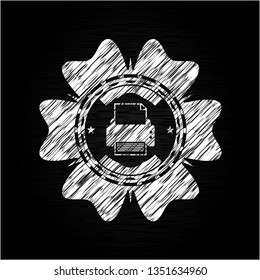 printer icon inside chalkboard emblem on black board