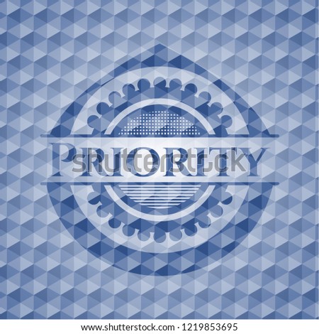 Priority blue hexagon emblem.