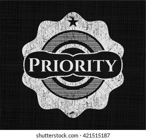 Priority chalkboard emblem on black board