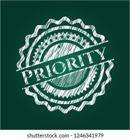 Priority chalkboard emblem written on a blackboard