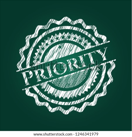 Priority chalkboard emblem written on a blackboard