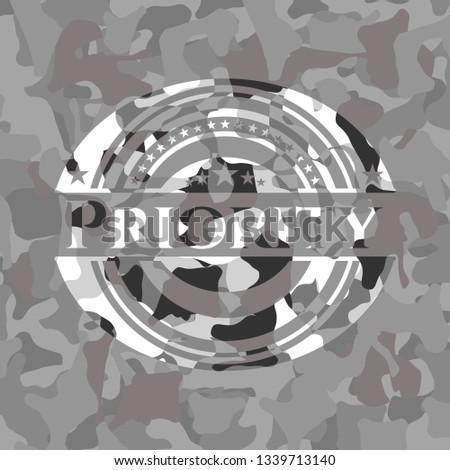 Priority grey camouflage emblem