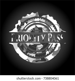 Priority Pass on grey camouflage texture