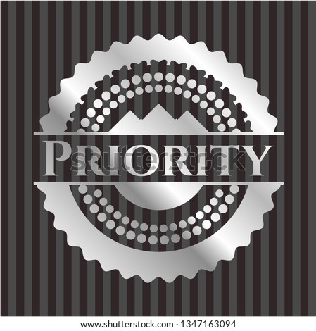 Priority silvery emblem or badge