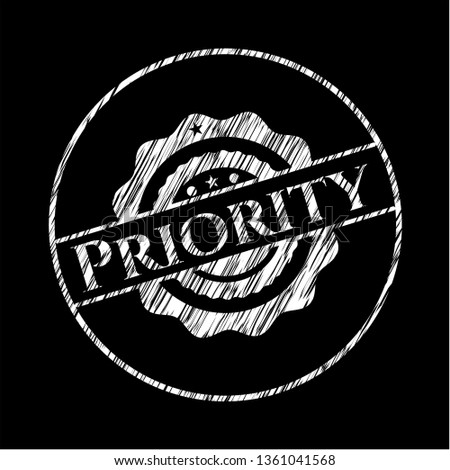 Priority written on a chalkboard