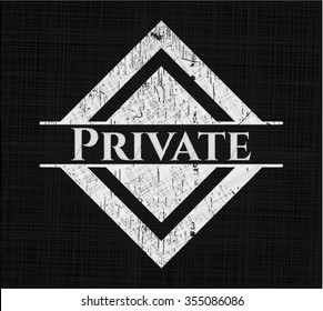 Private chalk emblem written on a blackboard