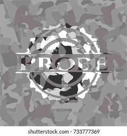 Probe written on a grey camouflage texture
