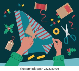 The process of wrapping Christmas gifts. Wrapping paper, scissors and ribbons in flat style
