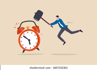 Procrastination postpone to get thing done later, too tight business deadline or cannot finish work in time concept, young man holding big hammer smashing on loud reminding alert alarm clock.