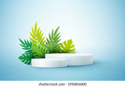 Product display podium decorated with tropical palm leaves on blue background